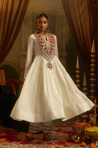 White mul cotton anarkali set featuring intricate multicolour hand embroidery.