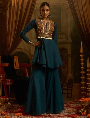 Teal blue mul cotton set with a long-sleeve flared peplum top, mirror-work embroidered yoke. 5