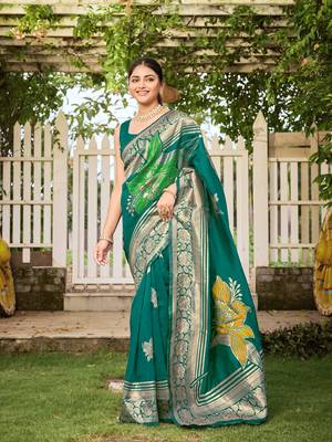 Women's teal green jacquard silk blend saree with zari floral border wear 1
