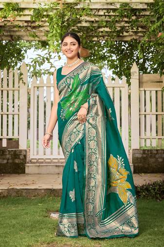 Women's teal green jacquard silk blend saree with zari floral border wear