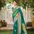 Women's teal green jacquard silk blend saree with zari floral border wear