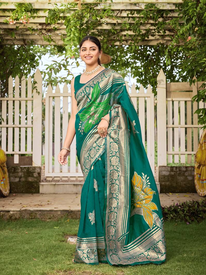 Women's teal green jacquard silk blend saree with zari floral border wear