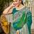 Women's teal green jacquard silk blend saree with zari floral border wear