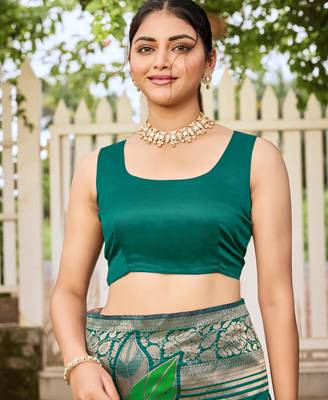 Women's teal green jacquard silk blend saree with zari floral border wear 4