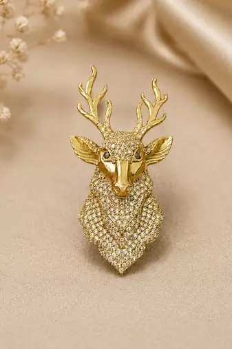 Royal gold-tone deer head statement brooch with crystal detailing