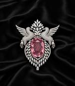 Elegant silver-tone swan brooch with large pink crystal & clear stone embellishment