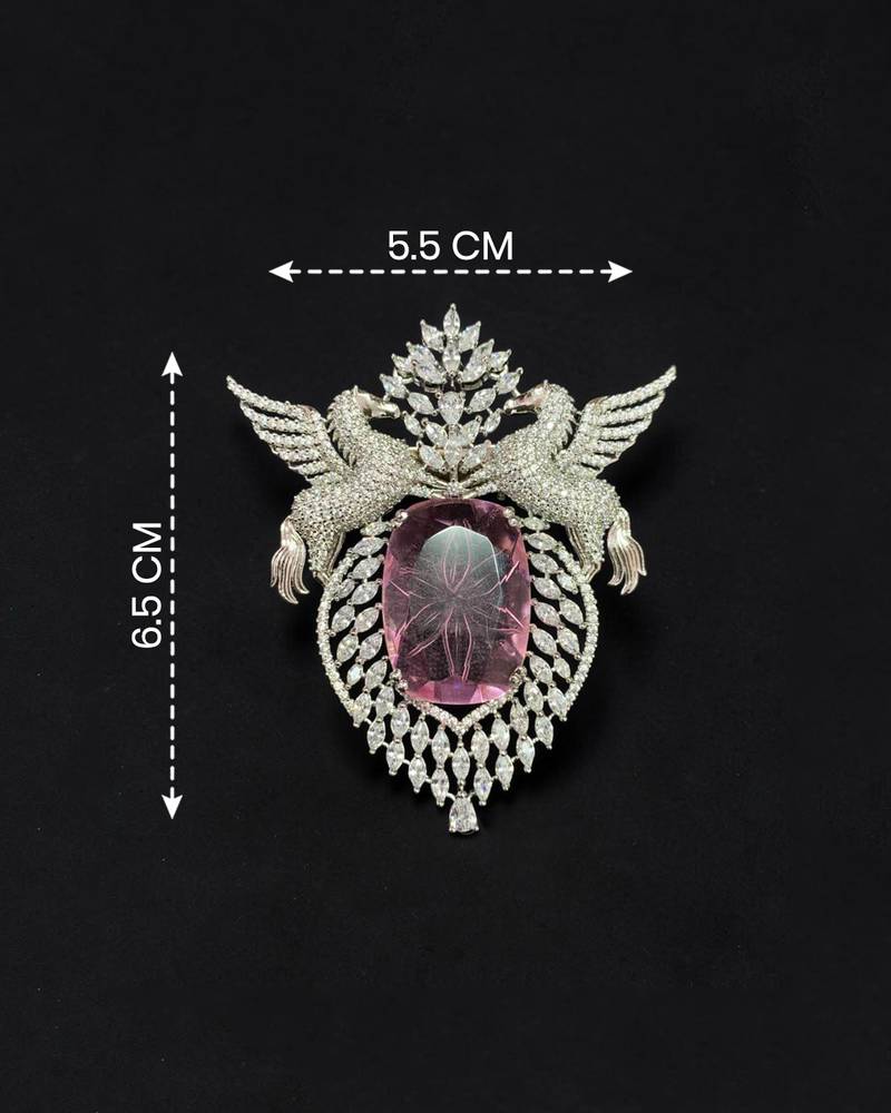 Elegant silver-tone swan brooch with large pink crystal & clear stone embellishment