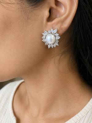 Elegant pearl and crystal floral stud earrings with silver-tone finish 2