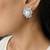 Elegant pearl and crystal floral stud earrings with silver-tone finish