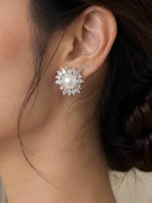 Elegant pearl and crystal floral stud earrings with silver-tone finish 3