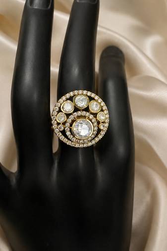 Elegant gold-tone round statement ring with clear stone studded design