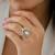 Elegant gold-tone round statement ring with clear stone studded design