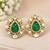 Emerald green teardrop stone gold-tone studded earrings