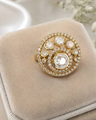 Elegant gold-tone round statement ring with clear stone studded design 3