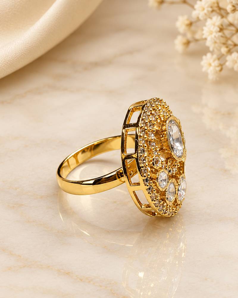 Elegant gold-tone round statement ring with clear stone studded design