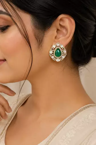 Emerald green teardrop stone gold-tone studded earrings