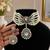 Elegant pearl choker necklace set with kundan-style pendant & matching drop earrings