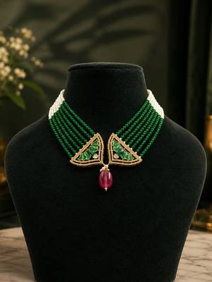 Elegant green beaded necklace with artistic pendant and ruby-tone drop 1