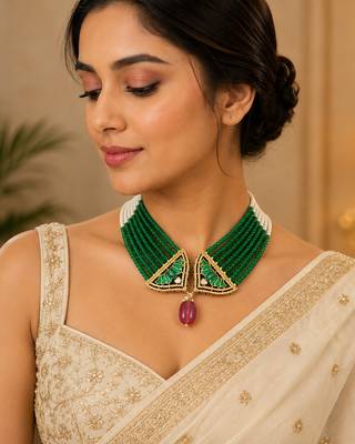 Elegant green beaded necklace with artistic pendant and ruby-tone drop 2