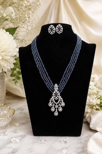 Elegant blue beaded long necklace set with crystal pendant & matching earrings