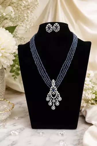 Elegant blue beaded long necklace set with crystal pendant & matching earrings