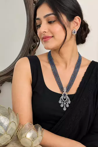 Elegant blue beaded long necklace set with crystal pendant & matching earrings