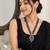 Elegant blue beaded long necklace set with crystal pendant & matching earrings
