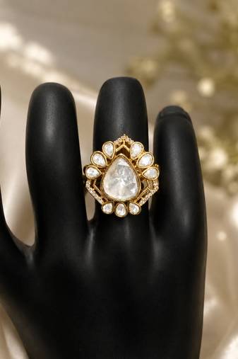 Elegant gold-plated teardrop statement ring with clear crystal stones