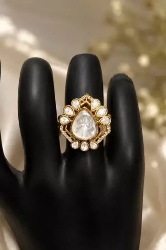 Elegant gold-plated teardrop statement ring with clear crystal stones