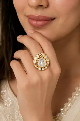 Elegant gold-plated teardrop statement ring with clear crystal stones