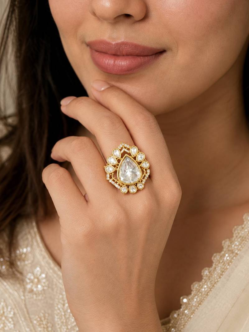 Elegant gold-plated teardrop statement ring with clear crystal stones