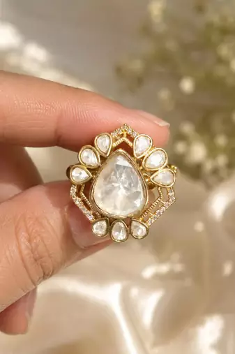 Elegant gold-plated teardrop statement ring with clear crystal stones