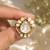 Elegant gold-plated teardrop statement ring with clear crystal stones