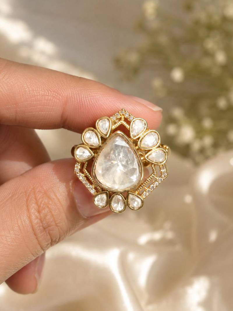 Elegant gold-plated teardrop statement ring with clear crystal stones