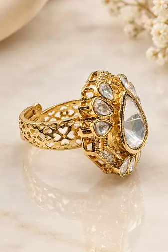 Elegant gold-plated teardrop statement ring with clear crystal stones