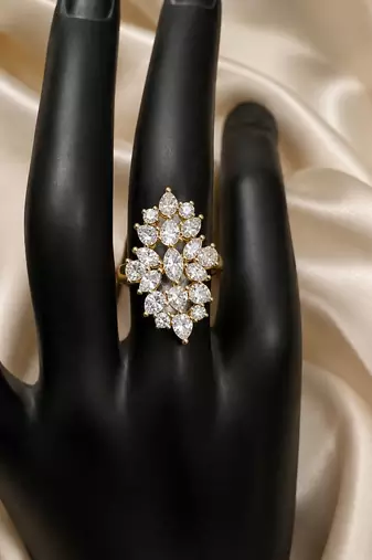 Elegant gold-plated floral cluster statement ring with clear stones
