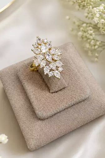 Elegant gold-plated floral cluster statement ring with clear stones