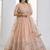 Lovable Peach Floral Embroidered Net Engagement Wear Lehenga Choli