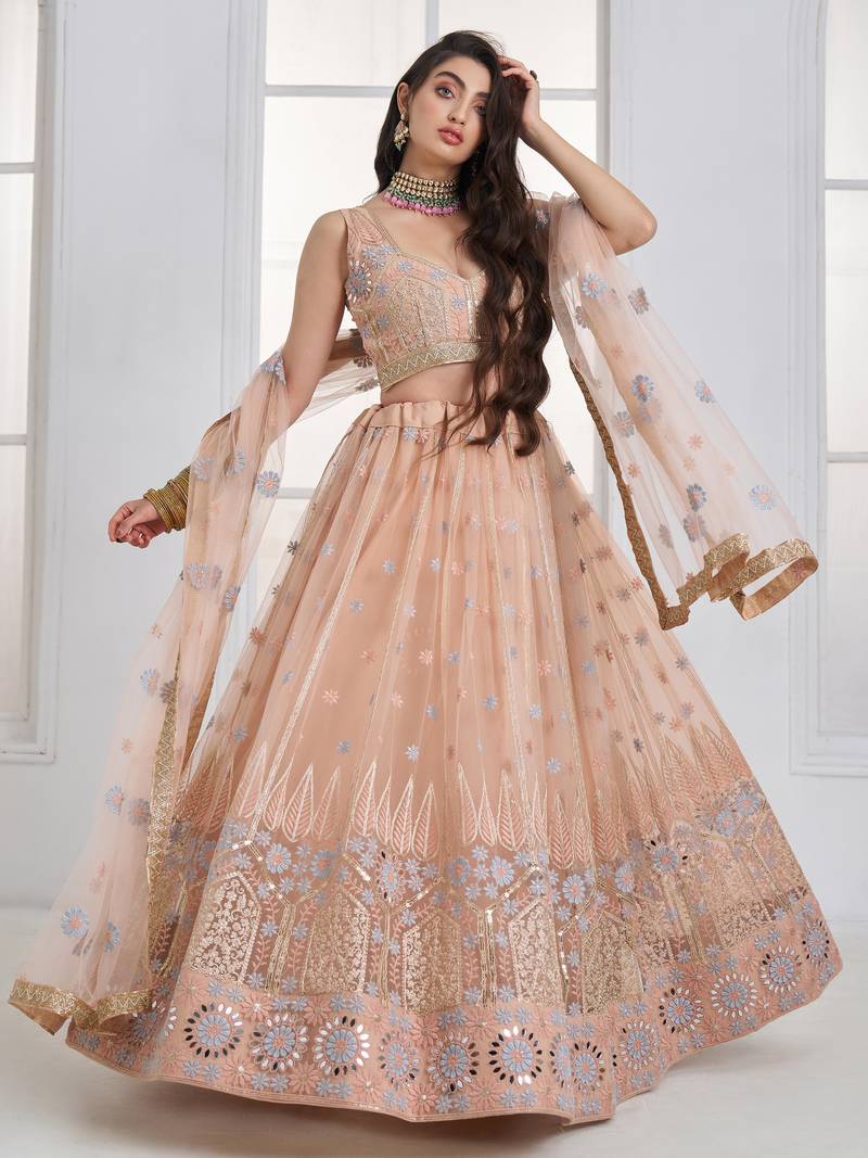 Lovable Peach Floral Embroidered Net Engagement Wear Lehenga Choli