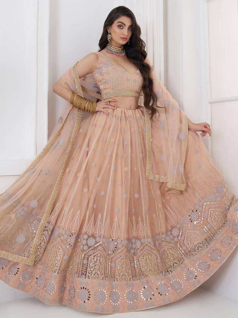 Lovable Peach Floral Embroidered Net Engagement Wear Lehenga Choli