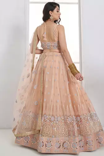 Lovable Peach Floral Embroidered Net Engagement Wear Lehenga Choli
