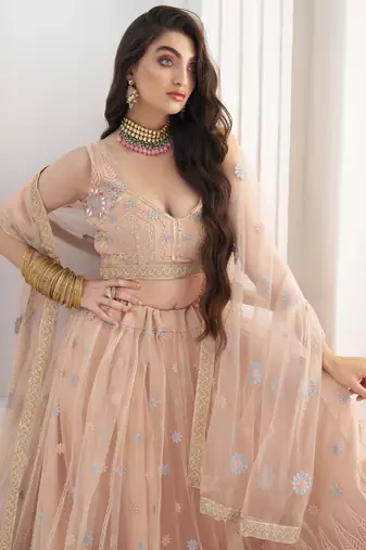 Lovable Peach Floral Embroidered Net Engagement Wear Lehenga Choli