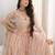 Lovable Peach Floral Embroidered Net Engagement Wear Lehenga Choli