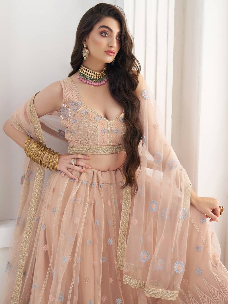 Lovable Peach Floral Embroidered Net Engagement Wear Lehenga Choli