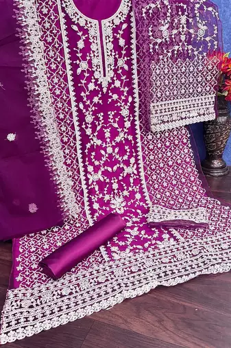 Purple net suit with coding and embroidery work