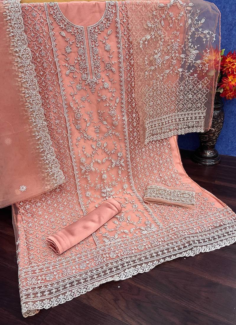 Peach net suit with coding and embroidery work