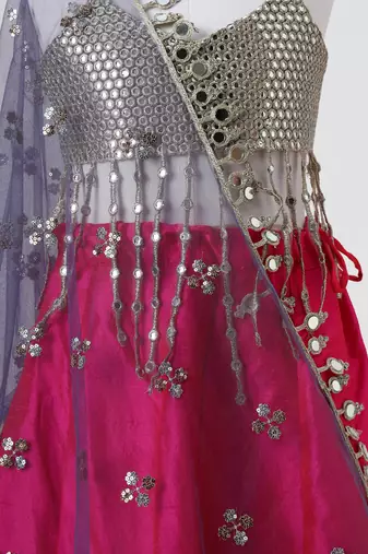 Silver and magenta embroidered faux and raw silk lehenga set