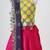 Yellow and pink embroidered raw silk organza lehenga set