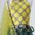 Yellow and green embroidered raw silk organza lehenga set