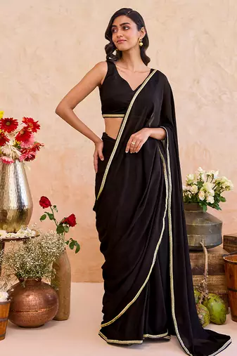 Black embroidered crepe silk blend saree set
